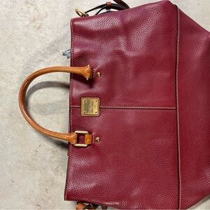 Red leather tote bag.
